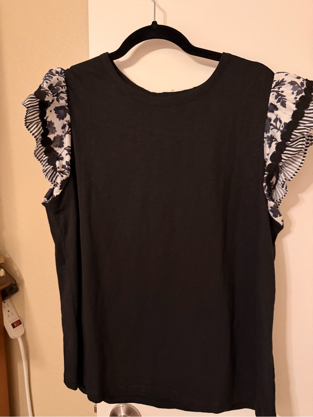 Black Ruffle Sleeve Top with Floral-Striped Accent